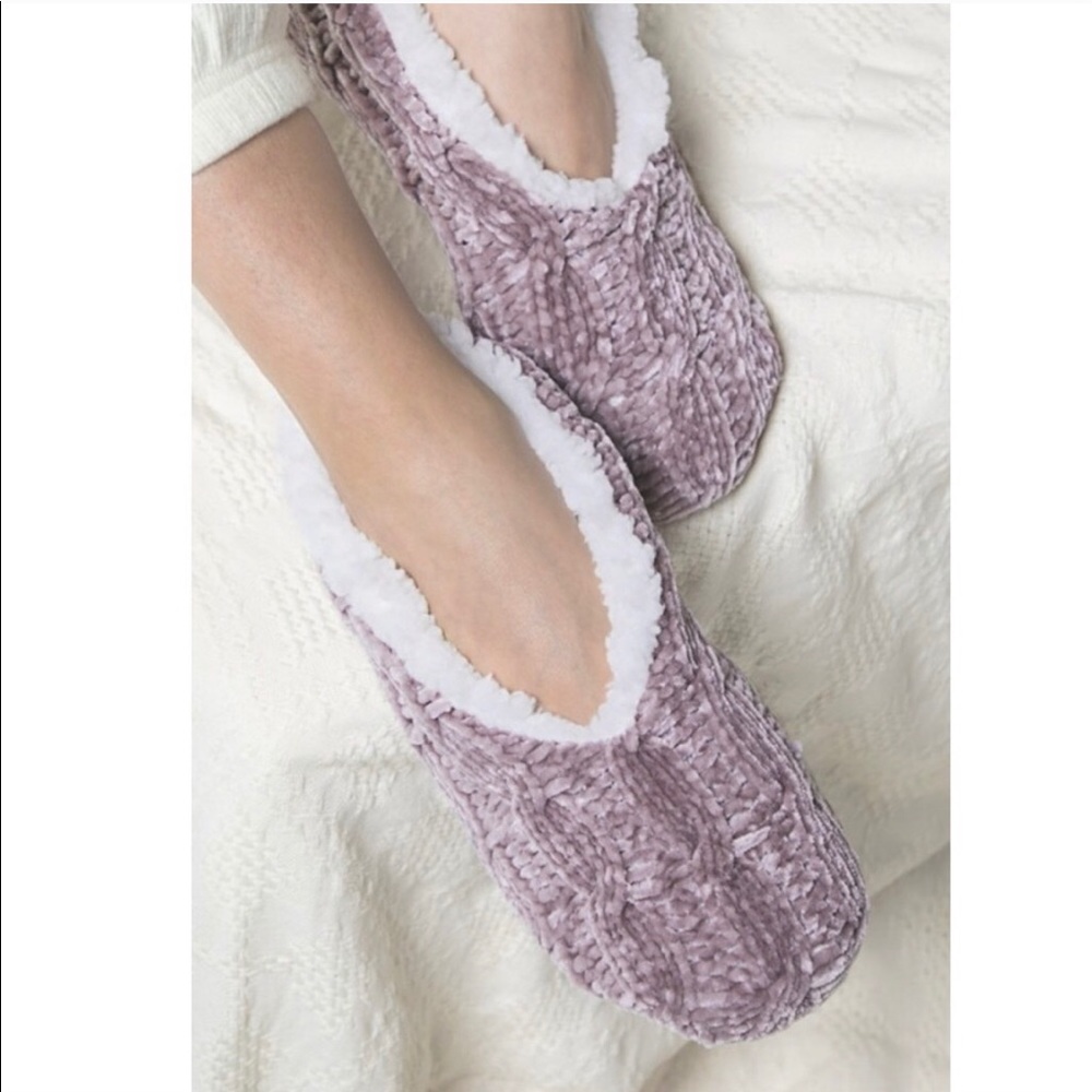 Soft and cozy mauve knit slippers.